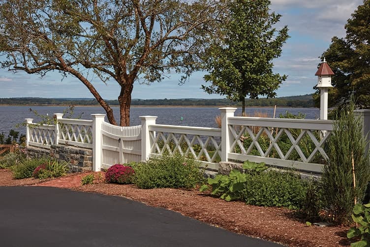 a fence along a driveway
