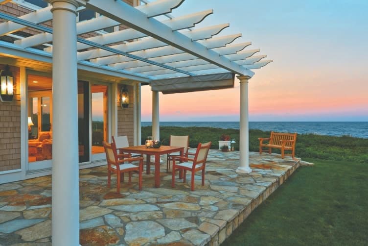 a pergola in a yard