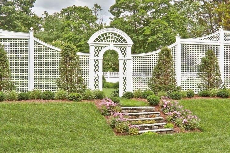 a lattice privacy screen in a yard